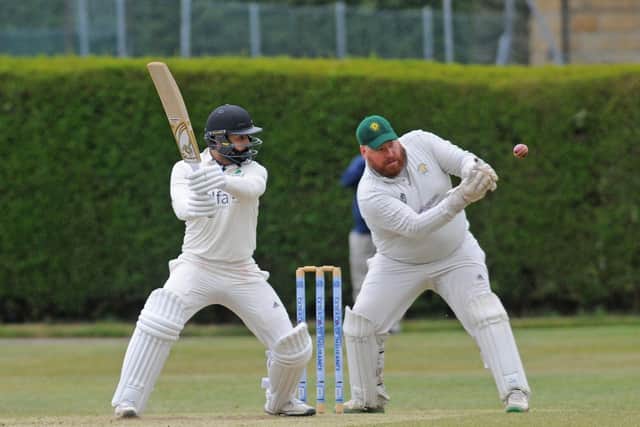 New Rover's Fahid Rehman cuts through cover point on the way to scoring 85 for the Aire Wharfe League Division 2 leaders in the win at Adel. Picture: Steve Riding.
