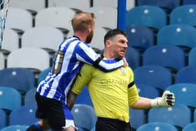 Saved: Sheffield Wednesday's Barry Bannan celebrates with goalkeeper Keiren Westwood for his penalty save.
