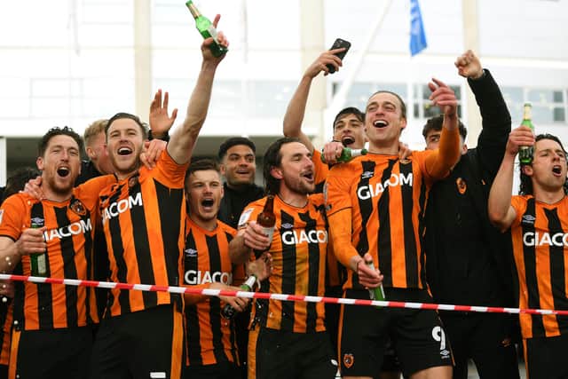 Hull's players run out of the KCOM Stadium to celebrate with their fans.
(
Picture: Jonathan Gawthorpe)