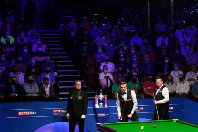 The World Championship final in front of a sell-out crowd at the Crucible.