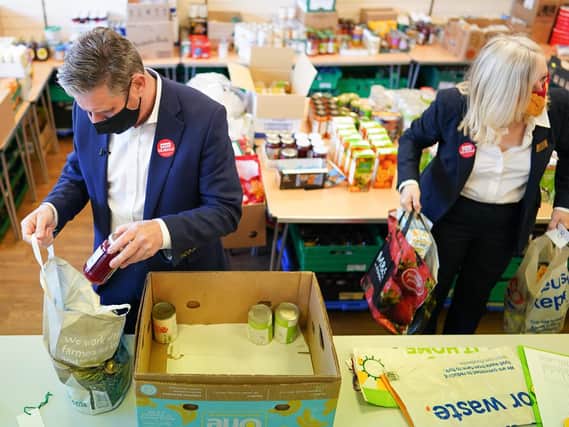 Labour leader Sir Keir Starmer and West Yorkshire Mayoral election candidate Tracy Brabin packing a box of food as he visits a food bank project at St Giles Food Share in Pontefract, West Yorkshire, during campaigning for the election for West Yorkshire mayor. Photo: PA