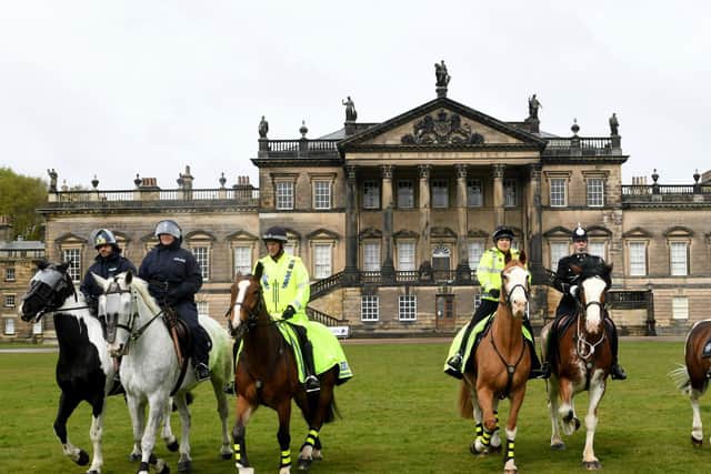 Some of the South Yorkshire Police Mounted division taking part in the Horses 4 Health baton relay at Wentworth Woodhouse.