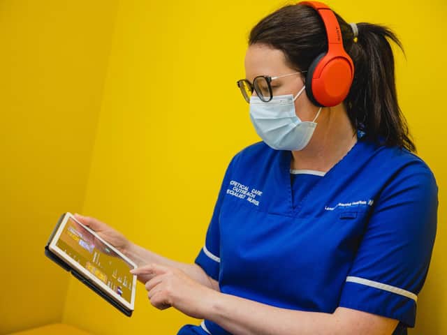 Nurse Sheleen Armstrong, 39, a sister working as part of the critical care outreach team, trialling MediMusic.