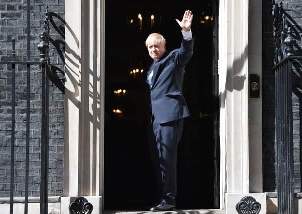Boris Johnson enters 10 Downing Street for the first time as Prime Minister moments after promising a "clear plan" to reform social care.