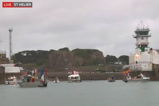 French fishing vessels staging a protest outside the harbour at St Helier. Image: BBC News