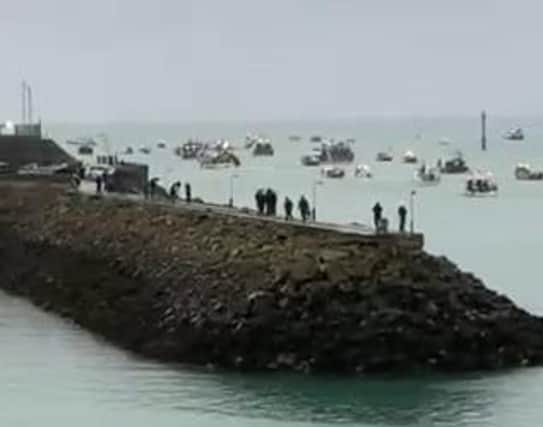 Screengrab from video courtesy of Alex Ferguson showing French fishing vessels staging a protest outside the harbour at St Helier, Jersey, Channel Islands, in a row over post-Brexit fishing rights.