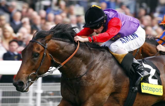 This was the Queen's Carlton House winning the 2011 Dante Stakes at York under Ryan Moore on a day of Royal history.