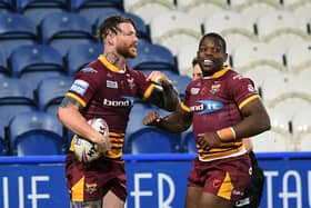 One better: Chris McQueen scored in the defeat against St Helens last month but is hoping Huddersfield can knock the champions out of the Challenge Cup. Picture: Jonathan Gawthorpe