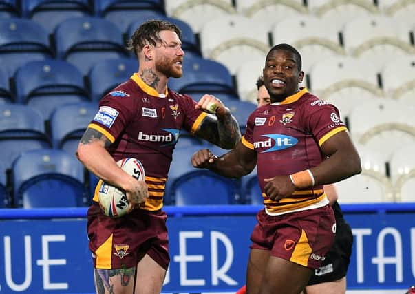 One better: Chris McQueen scored in the defeat against St Helens last month but is hoping Huddersfield can knock the champions out of the Challenge Cup. Picture: Jonathan Gawthorpe
