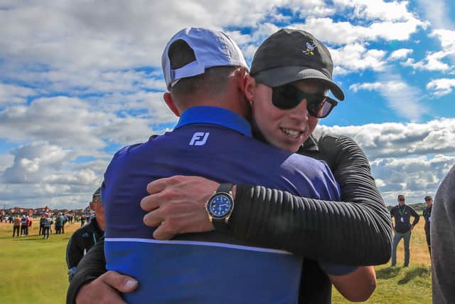 Alex Fitzpatrick gets a hug from his older brother Matt during the 2019 Walker Cup (Picture: PA)