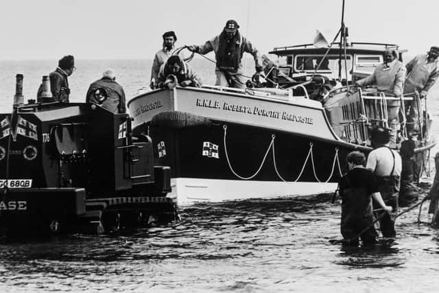 Graham Taylor (top right) on the Robert and Dorothy Hardcastle lifeboat returning from South Shields in 1987.