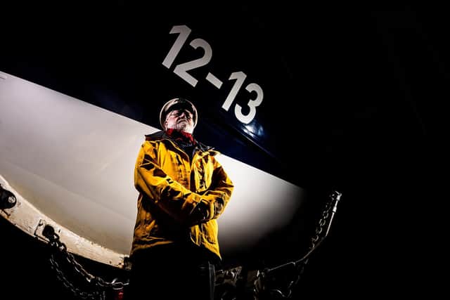 Graham Taylor with the Mersey lifeboat before it left Filey last month. Picture: James Hardisty
