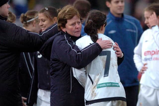 DENIED: Leeds United manager Julie Chipchase hugs Nicole Emmanuel after defeat to Arsenal in the FA Women's Premier League Cup Final at Scunthorpe in March 2007.