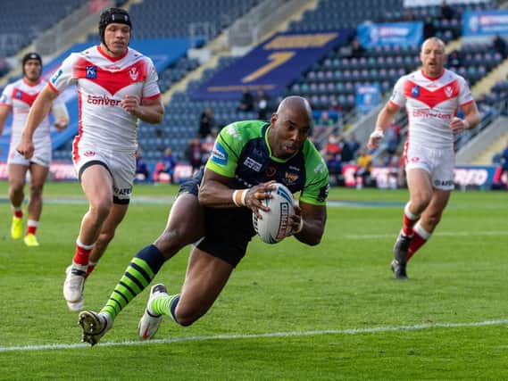 Huddersfield Giants' Michael Lawrence opens the scoring against St Helens. (BRUCE ROLLINSON)