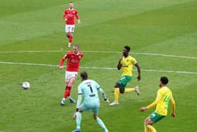 Cauley Woodrow fires Barnsley into the lead against Norwich City. Pictures: Getty Images