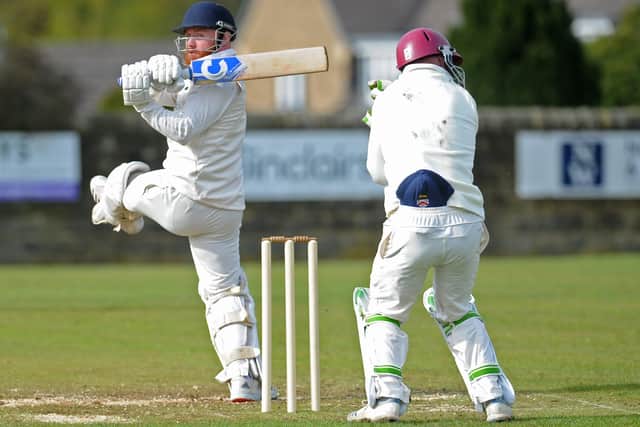 Beckwithshaw wicket keeper Callum Irvine takes cover as Otley batsman Sam Kellett scores runs (Picture: Steve Riding)