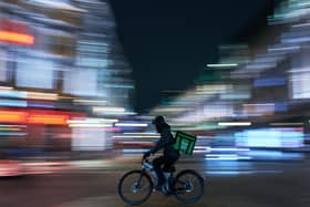 Library image of an Uber Eats delivery rider. Wendy’s will be partnering with Uber Eats to provide delivery options.