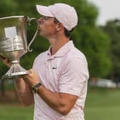 Winner: Rory McIlroy kisses the trophy after winning the Wells Fargo Championship,