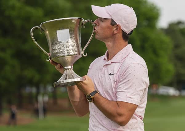 Winner: Rory McIlroy kisses the trophy after winning the Wells Fargo Championship,