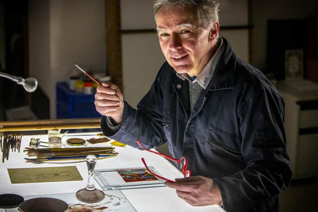 Mr Cooke uses traditional glass painting techniques to create his artworks.