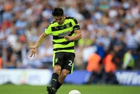 Huddersfield Town's Christopher Schindler scores the winning penalty to take the Terriers into the Premier League in May 2017. Picture: PA.