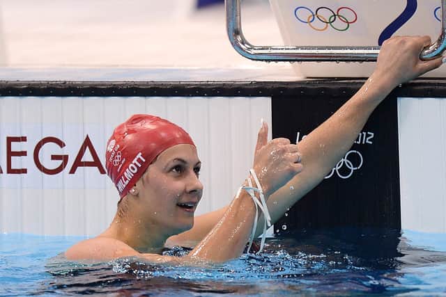 Great Britain's Aimee Willmott celebrates after winning her Women's 400m Individual Medley Heat at the Aquatics Centre in London on day one of the London 2012 Olympics. (Picture: Tony Marshall/PA Wire)