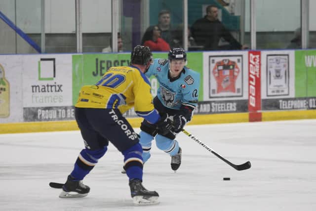 Kieran Brown, in action for Sheffield Steeldogs during the 2019-20 NIHL National season against Leeds Ciefs' Bobby Streetly. Picture courtesy of Cerys Molloy.