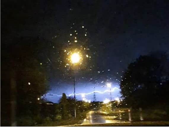 This picture tweeted out by West Yorkshire Police's dogs unit shows a huge crack of lightning in the sky