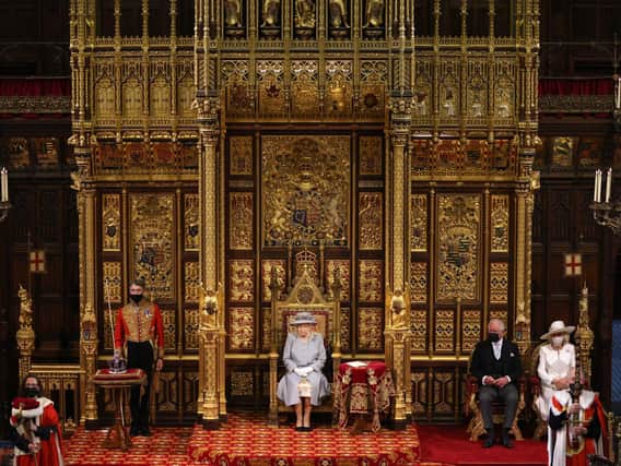 Queen Elizabeth II delivers a speech from the throne in House of Lords as she outlines the government's legislative programme for the coming session