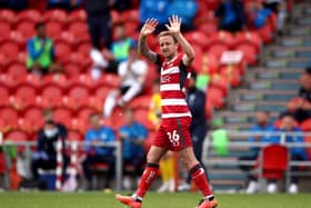 Doncaster Rovers' James Coppinger makes an emotional farewell, as he retires from playing. Picture: Tim Goode/PA