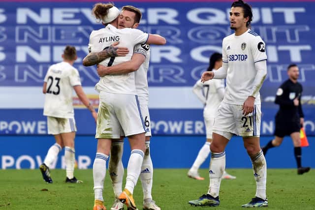 DECISION: Liam Cooper (hugging Luke Ayling) and Pascal Struijk (far right) are vying to be Leeds United's left-sided centre-back at Burnley