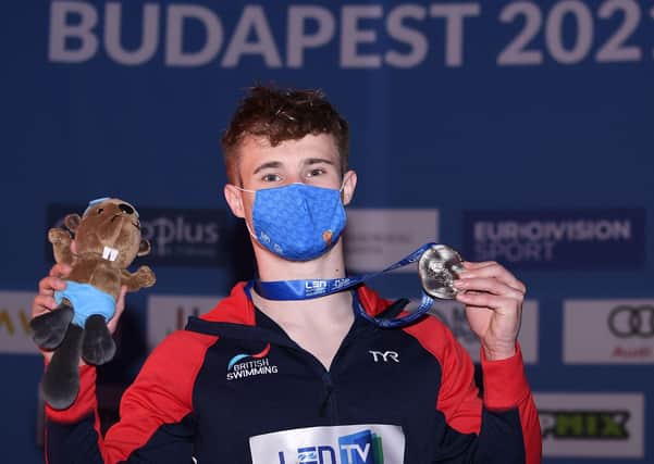 Great Britain's Jack Laugher with his silver medal after the men's 1m springboard final at the Diving event during the European Aquatics Championships. Picture: Attila Kisbenedek/Getty Images.