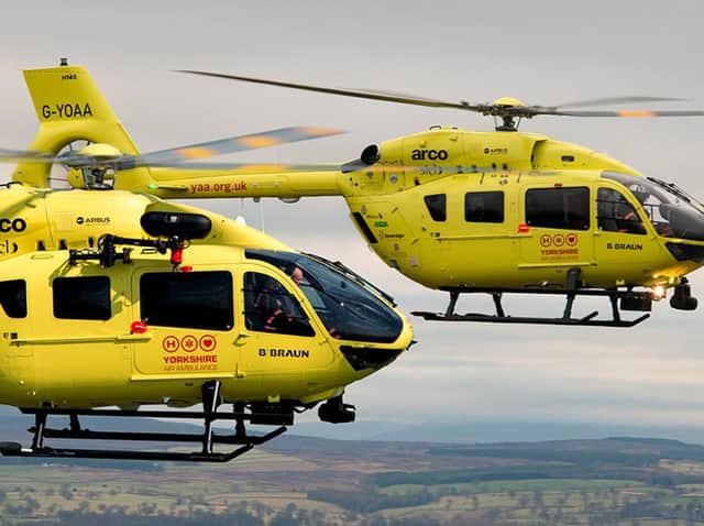 The two current helicopters in flight