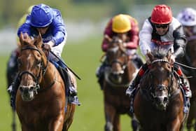 William Buick riding Hurricane Lane (left) on their way to winning the Al Basti Equiworld Dubai Dante Stakes during day two of the Dante Festival at York Racecourse.
