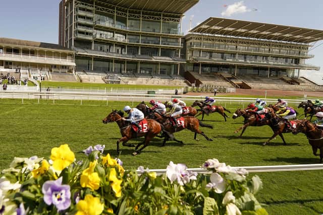 James Sullivan riding Copper Knight (left) winning the Matchbook Betting Exchange Handicap during day two of the Dante Festival at York Racecourse.