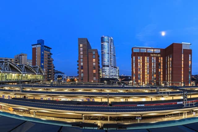 Pictured, Leeds city skyline of modern architecture and rail tracks in the foreground, Leeds, England. David's new app aims to help rail travellers reduce their carbon footprint. Photo credit: Adobe.stock