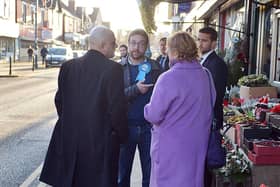 Alexander Stafford (centre) campaigning before the 2019 General Election with then Chancellor Sajid Javid.