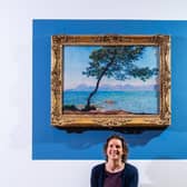 Ferens Art Gallery in Hull is to exhibit a painting by Impressionist Claud Monet as it reopens on Monday. Pictured Claire Longbrigg, exhibition officer, with the painting Antibes, 1888. Image by James Hardisty