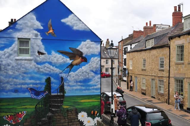 Sam Porter caused a stir recently when he painted a giant mural on a gable end in Cheapside Knaresborough. Gerard Binks/JPIMedia