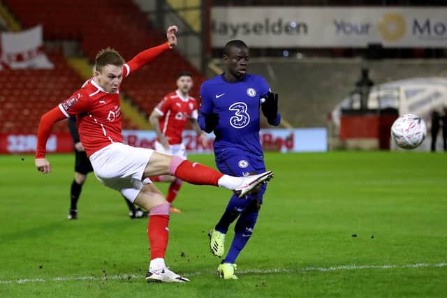 Letting fly: Cauley Woodrow has a shot against Chelsea during the Emirates FA Cup fifth round match at Oakwell.