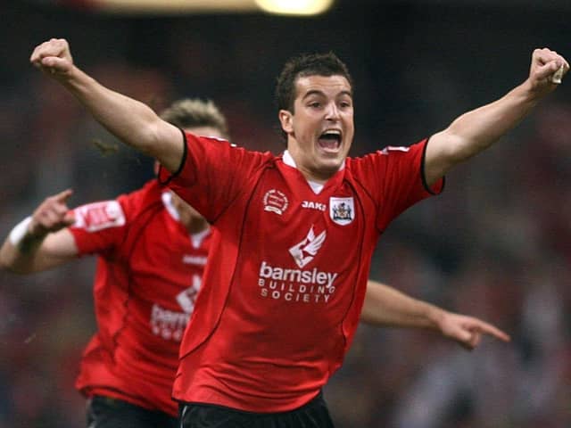 Victory charge: Barnsley's Dale Tonge leads the celebrations.