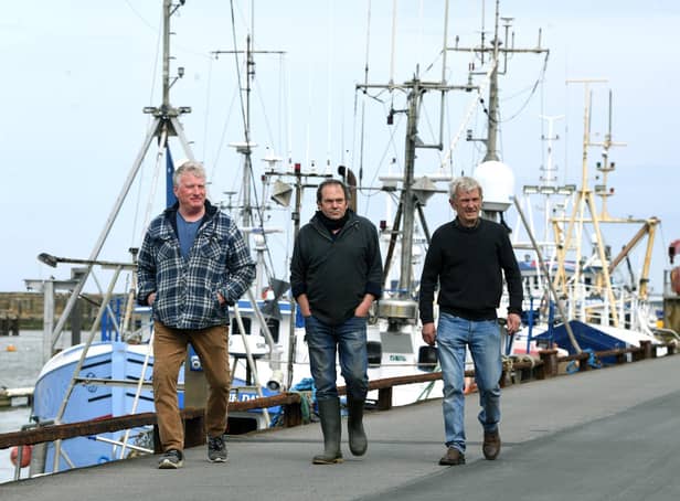 Fishermen, from left, Andrew Sanderson, Frank Powell and Shaun Wingham, pictured at Bridlington harbour. Picture: Jonathan Gawthorpe