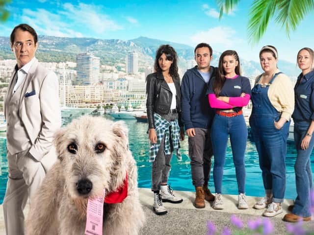 Frank in Monaco and staff from the kennels who were in hot pursuit after he stole their winning Lottery ticket