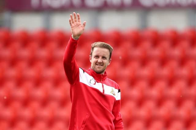 Farewell: James Coppinger waves after his final appearance.
