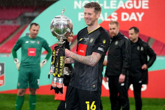 Trophy triumph: Harrogate Town's Jon Stead celebrates with the FA Trophy.