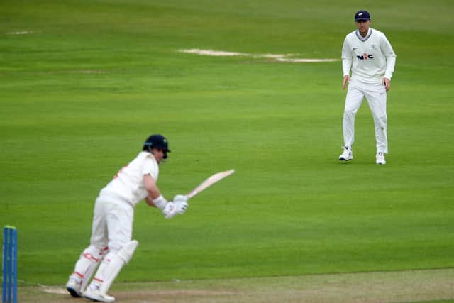 Yorkshire's Joe Root in the field watching his brother Glamorgan batsman Billy Root during day two match at Sophia Gardens. Picture: Nick Potts/PA