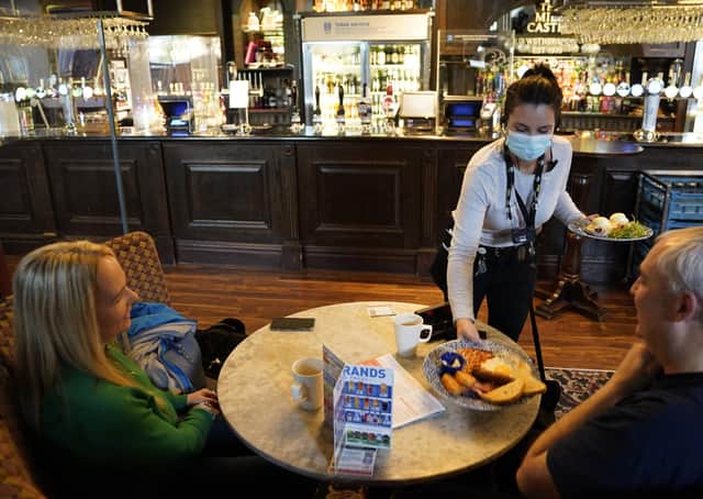 Customers inside a pub as indoor hospitality and entertainment venues reopen to the public following the further easing of lockdown restrictions in England.