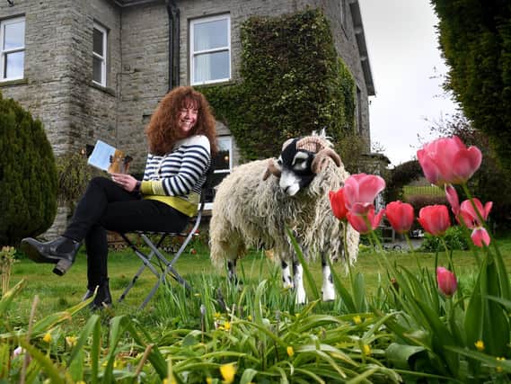 House at Hawes B&B owner Fiona Gardham with the life-size ram made by Em Fountain