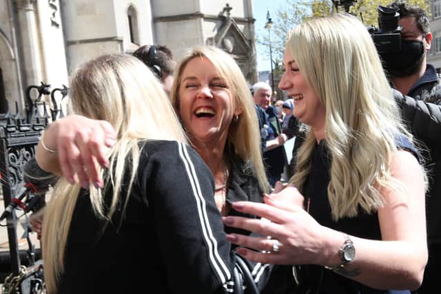 Janet Skinner (centre), with her niece Hayley Adams (right) and her daughter Toni Sisson, celebrating outside the Royal Courts of Justice, London, after having her conviction overturned by the Court of Appeal last month. Picture: Yui Mok/PA