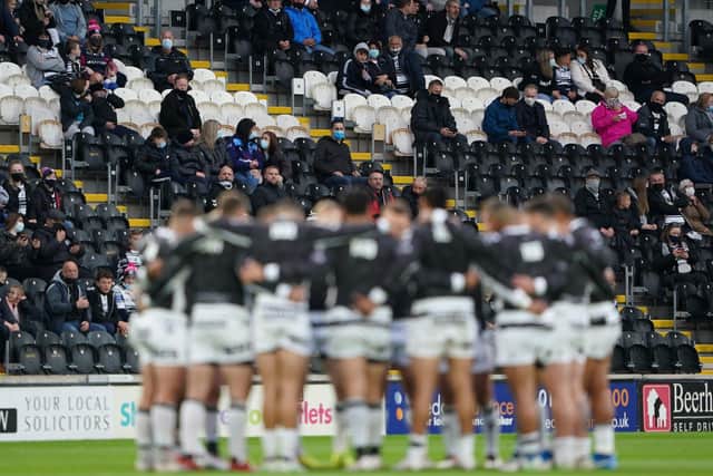 Hull FC players for a huddle.